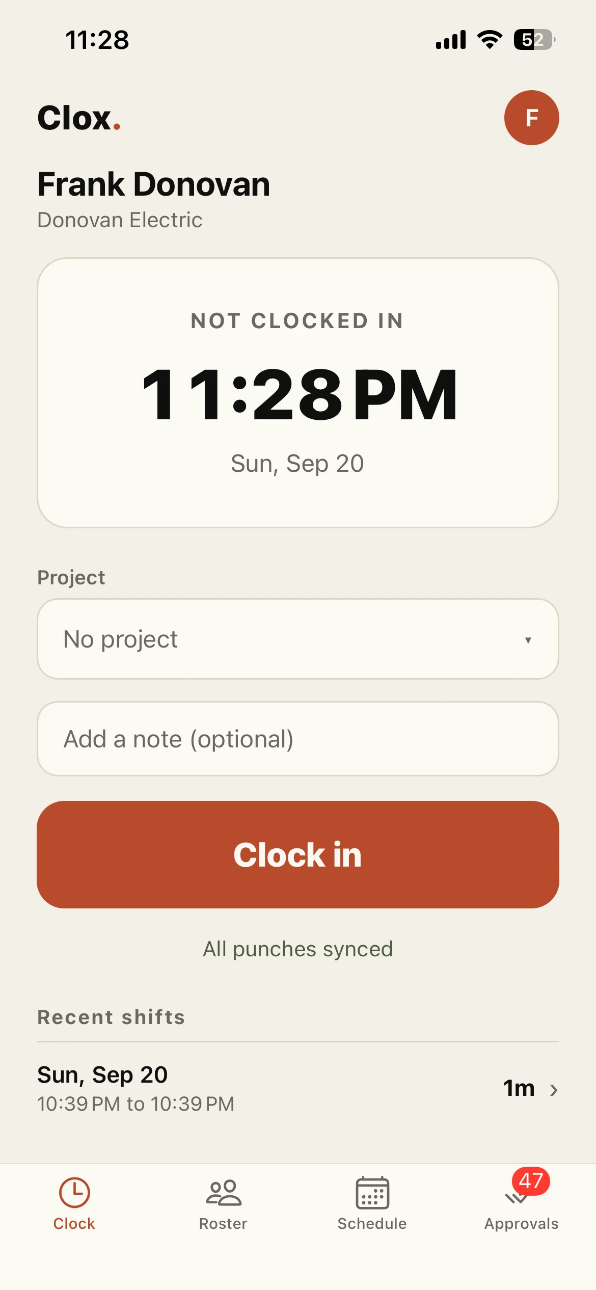 The Clox app clock screen, not clocked in, with a large Clock in button and the line All punches synced below it.