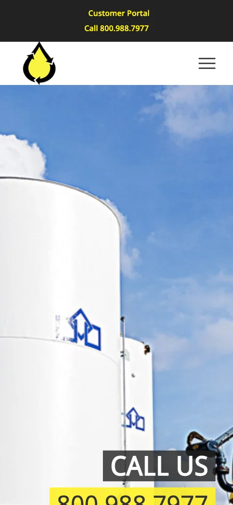 The old UES homepage on a phone: a photo of storage tanks with "Call us" and a phone number over it.